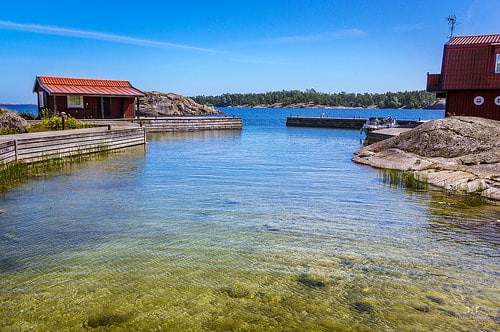 Cottages and sea, Fjärdlång, Stockholm (Sweden) by Tommie Hansen waterfront cabin photo
