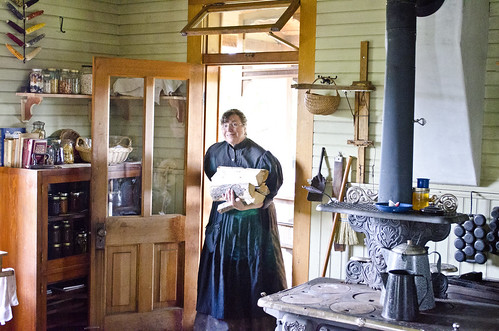 historical re-enactor brings in wood - Kitchen - Tinsley Living Farm - Museum of the Rockies - 2013-07-08 by Tim Evanson log cabin kitchen photo