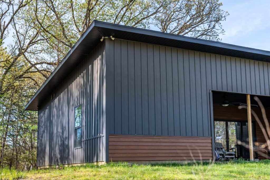 A home with a mix of TruLog steel lap siding and steel board and batten siding