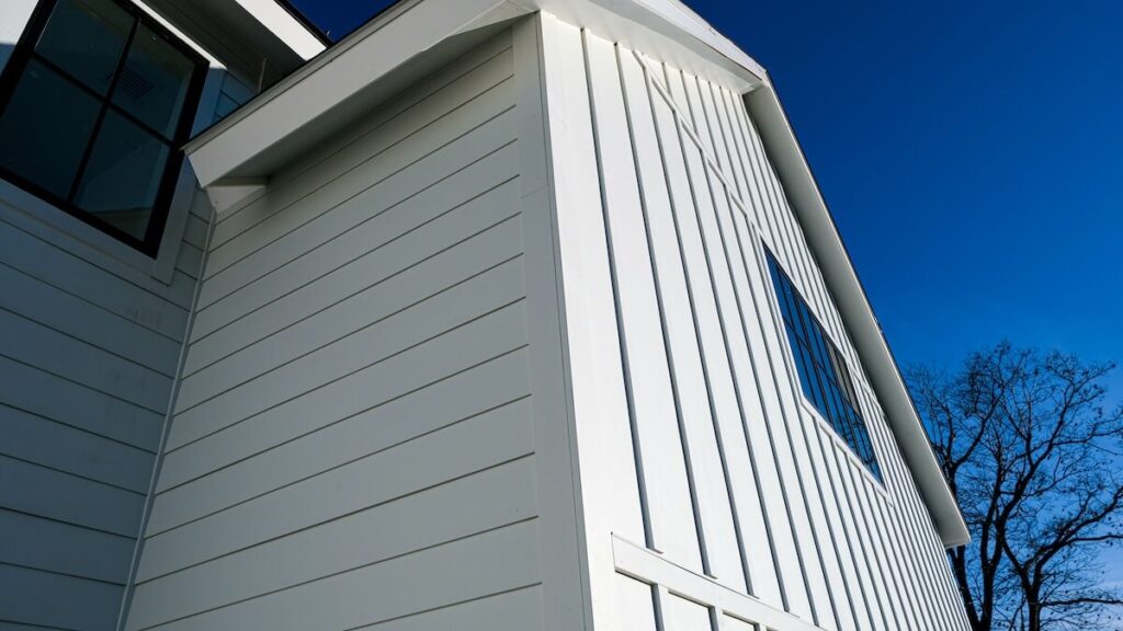 A closeup of a home with Hardie Board fiber cement siding