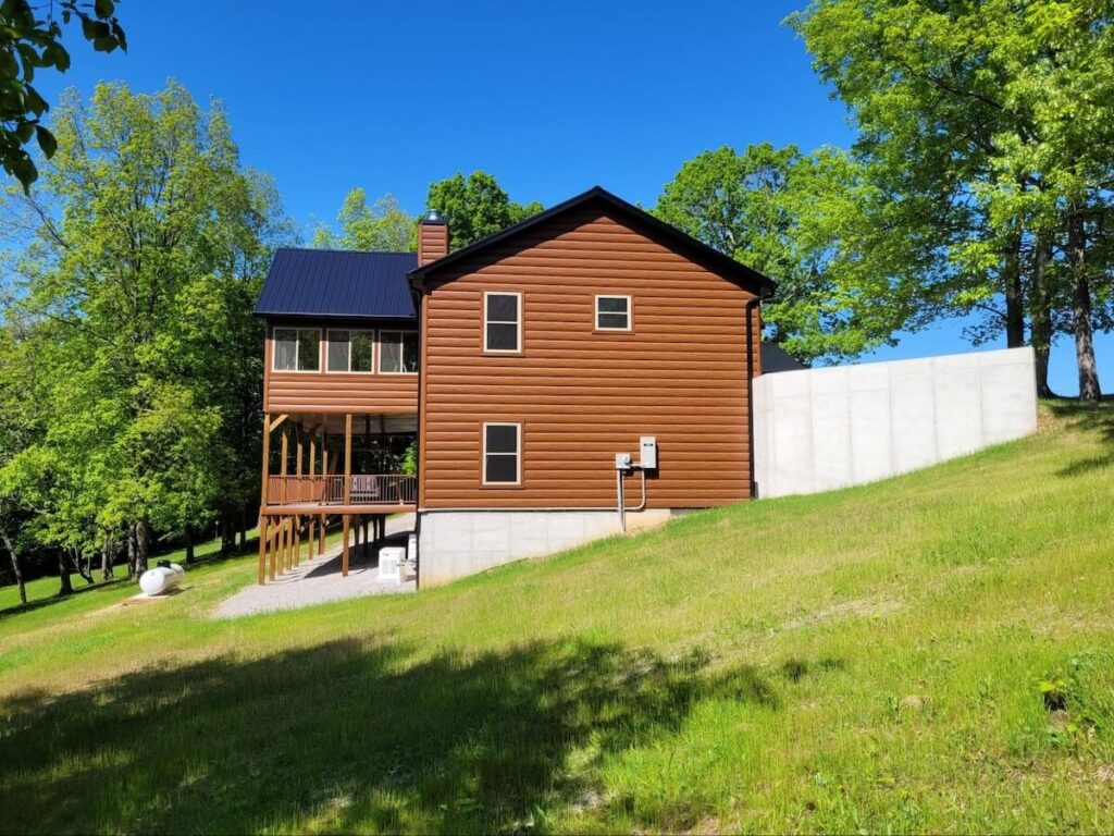 A home with TruLog steel log siding that has a real wood look