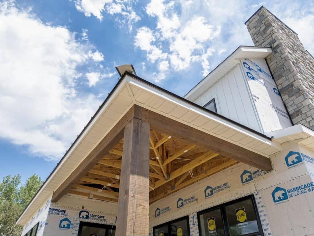 A closeup view of TruLog steel soffit and fascia during a home's siding installation