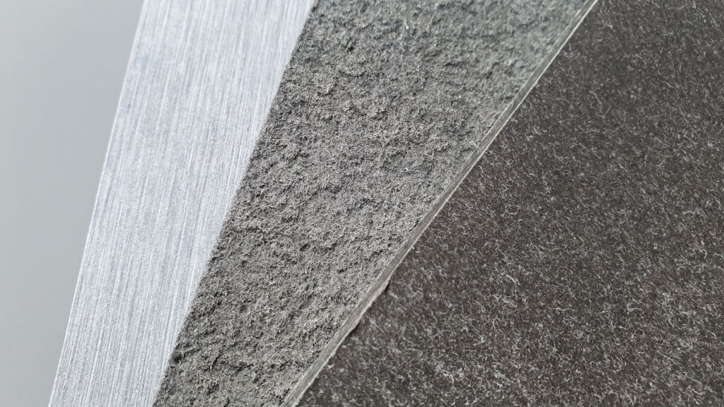A sampling of fiber cement siding boards, a vinyl siding alternative