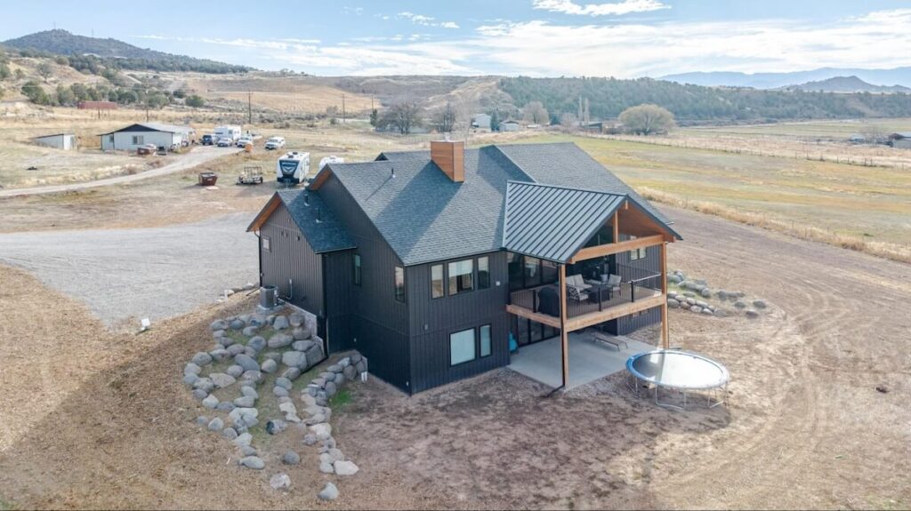 A beautiful two-story home with hail-resistant siding, Trulog's steel board and batten