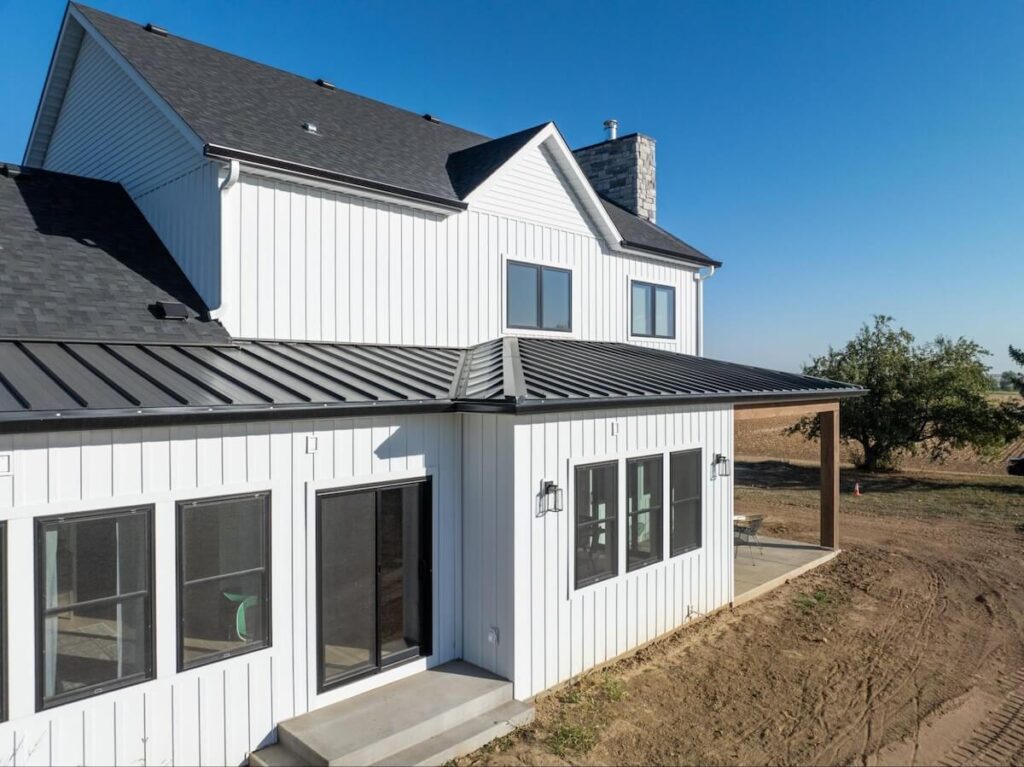 A home with newly installed TruLog steel board and batten siding