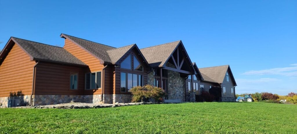 A home on a sunny day with TruLog steel log siding