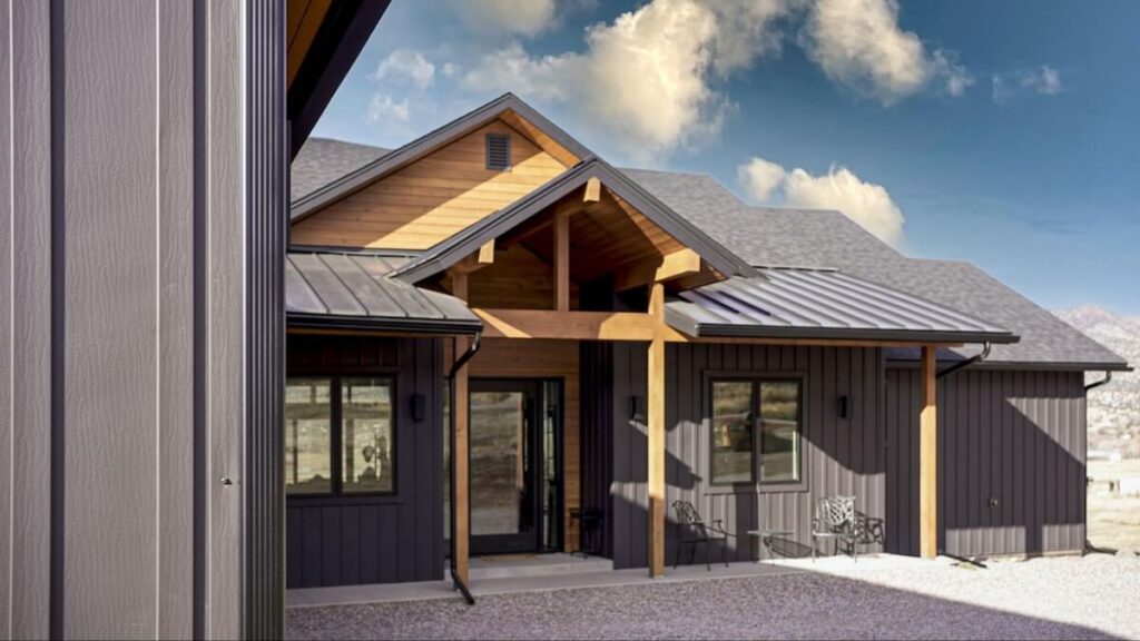 The front elevation of a ranch home with TruLog steel board and batten siding