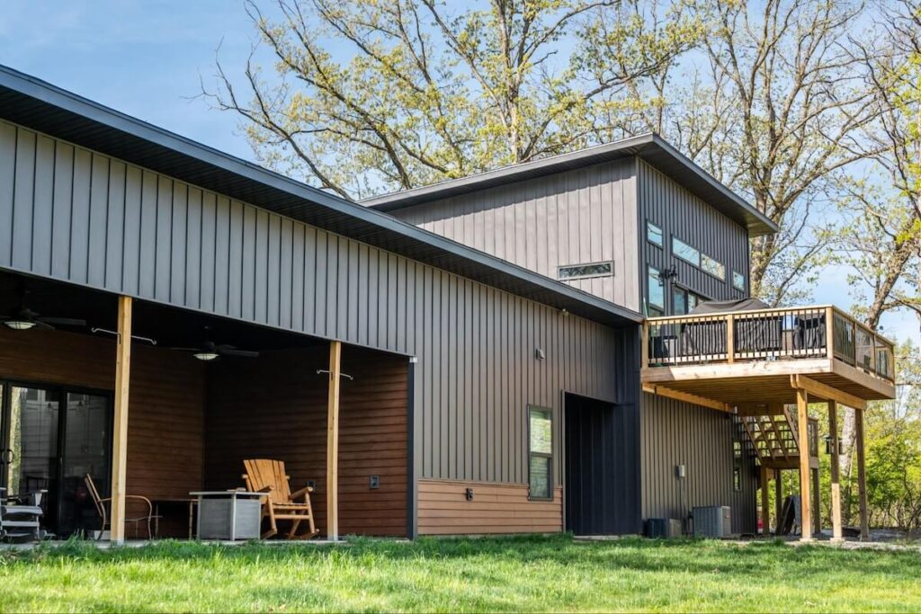 A modern-style home with TruLog steel board and batten siding
