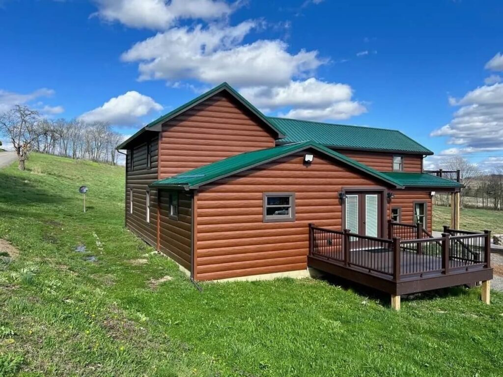 A home with new TruLog steel log siding