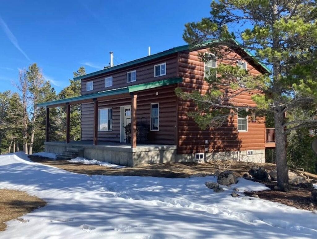 How long does siding last? Home with TruLog steel log siding