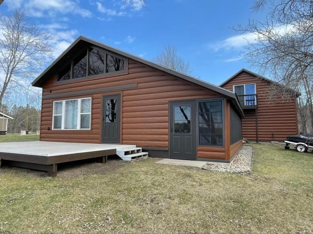 An updated home exterior with TruLog steel log siding