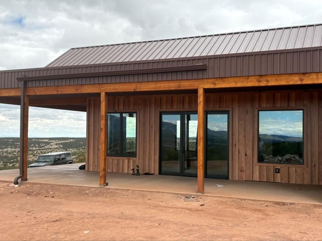 A modern ranch with TruLog steel board and batten siding with a real wood look